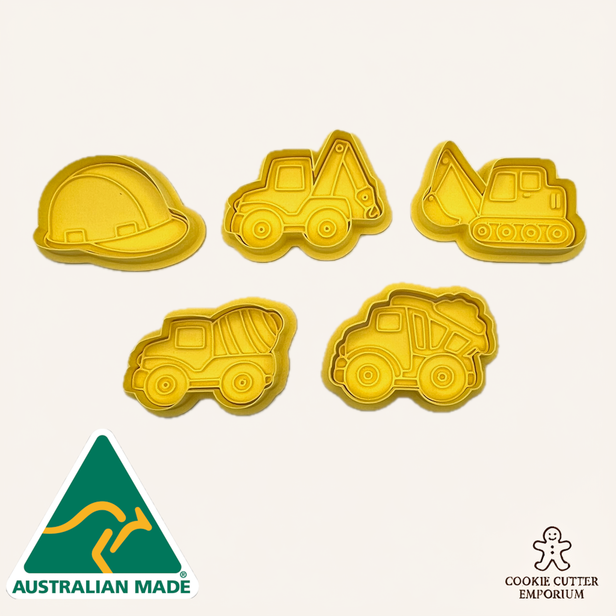 Set of five yellow construction-themed cookie cutters on a white background with 'Australian Made' and 'Cookie Cutter Emporium' logos.