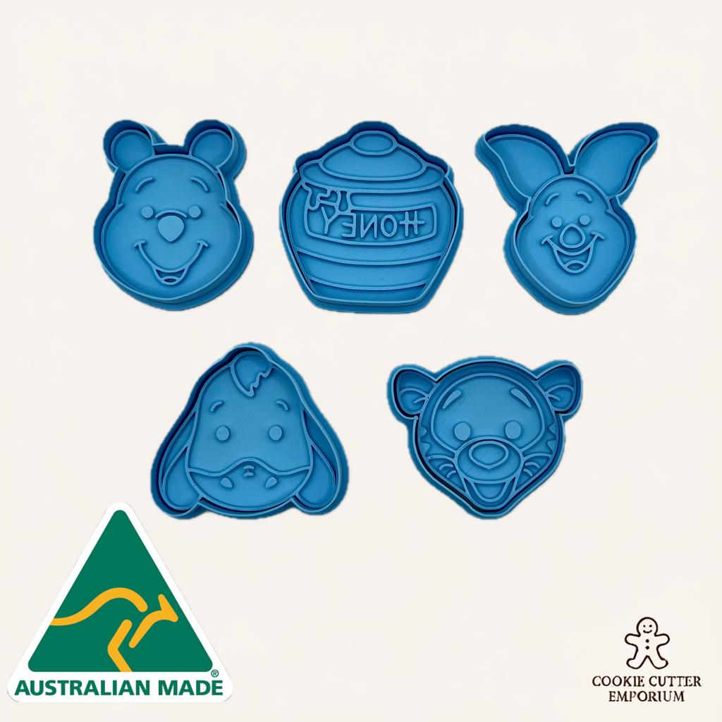 Set of blue cookie cutters shaped like cartoon characters on a white background with 'Australian Made' and 'Cookie Cutter Emporium' logos.