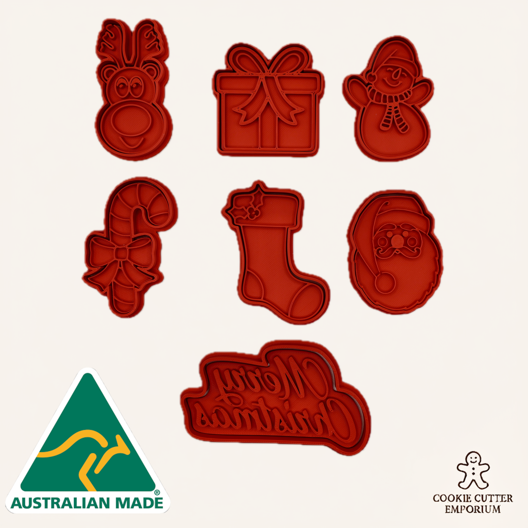 Set of red cookie cutters with Christmas designs on a white background, featuring 'Australian Made' and 'Cookie Cutter Emporium' logos.
