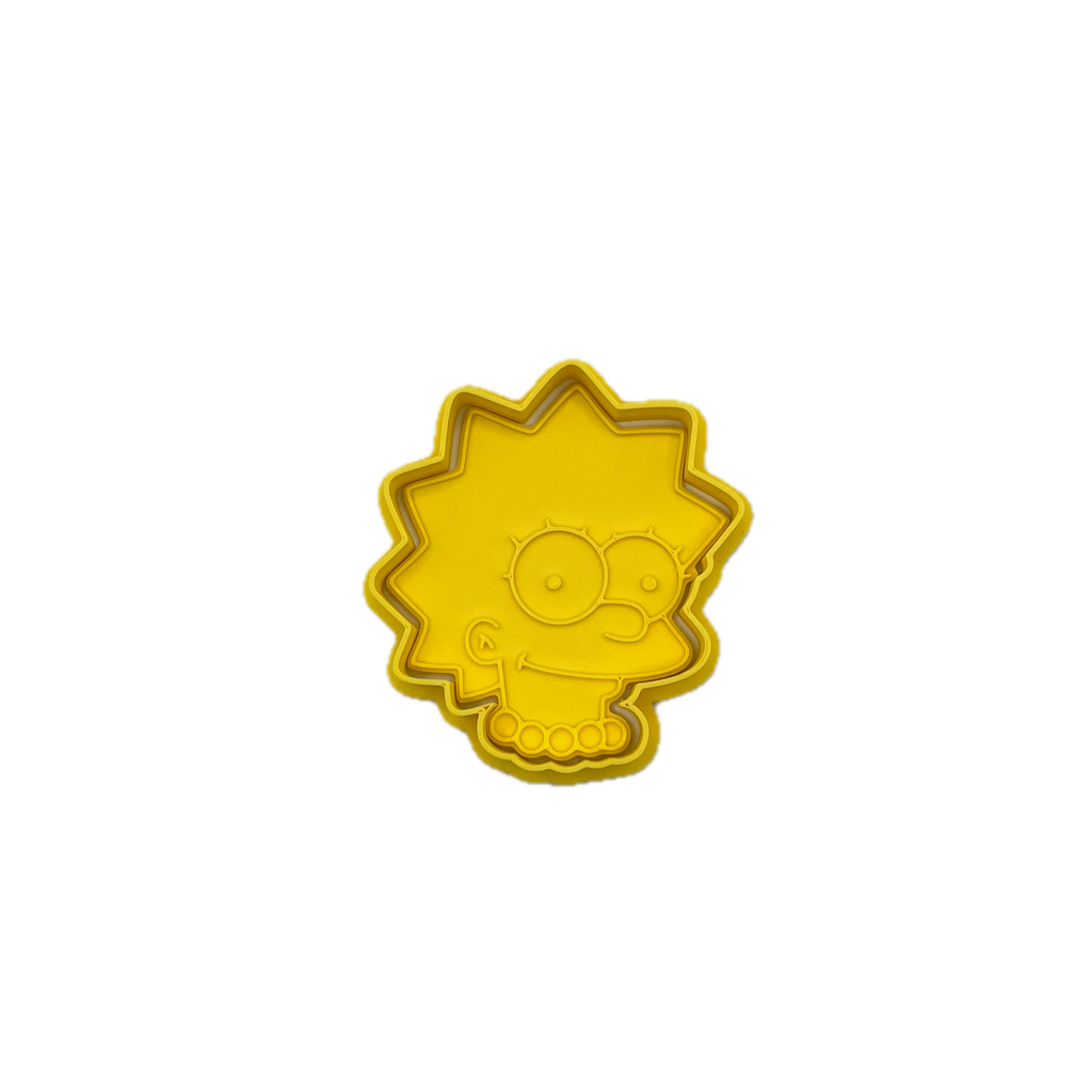 クラシックな漫画風のツンツンヘアの女の子キャラクターのクッキー型とフォンダンスタンプ – レトロなファミリーパーティー